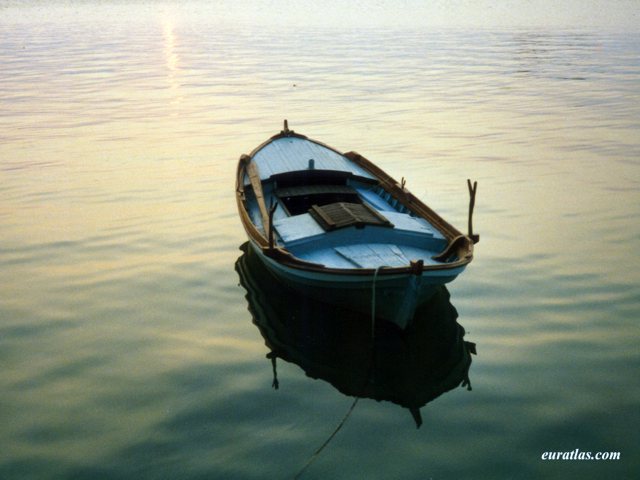 Click to download the A Fishing Boat at Sunset